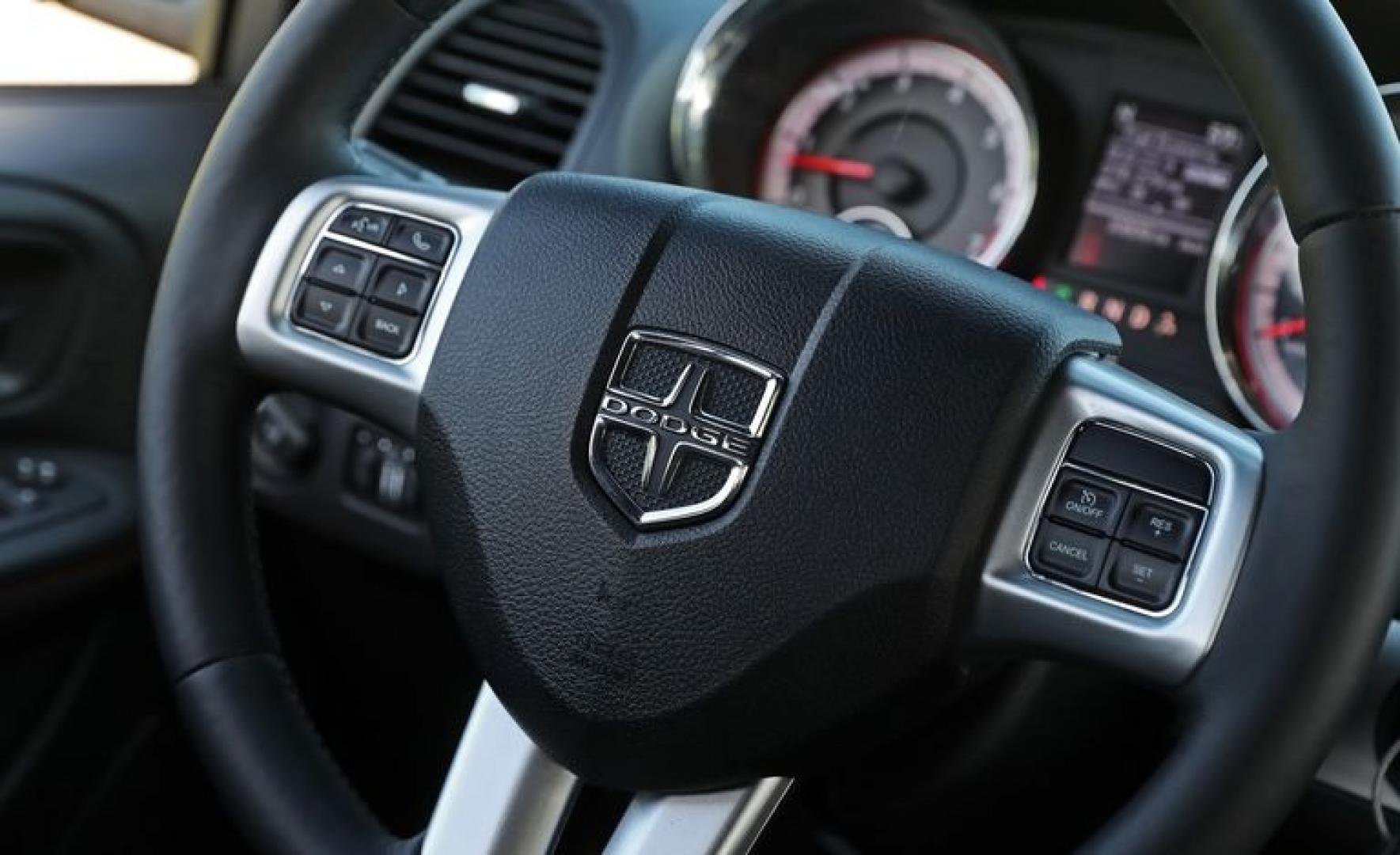 2017 Silver /Black Dodge Grand Caravan GT (2C4RDGEG0HR) with an 3.6L V6 DOHC 24V engine, 6A transmission, located at 3160 South Valley View Blvd, Las Vegas, NV, 89146, (888) 750-6845, 36.132458, -115.190247 - The 2017 Dodge Grand Caravan is all about transporting a bunch of people at an affordable price. This seven-passenger minivan undercuts its least expensive competitor by thousands of dollars when new. Even when loaded to the hilt with options, the price tag doesn't come close to its high-rent rivals - Photo#14